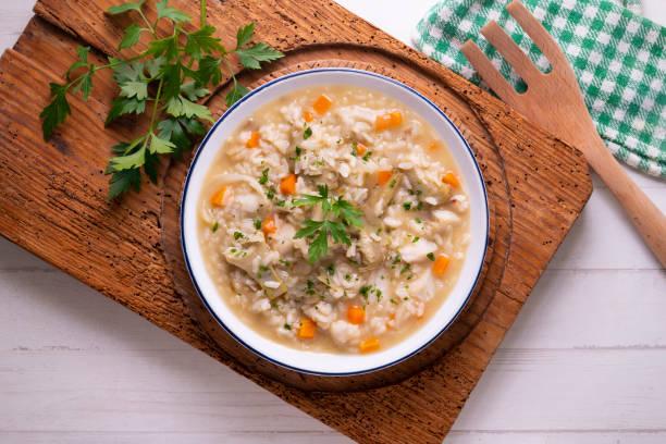 istock Soupy rice with artichokes and carrots. Typical Spanish gastronomy platter. 1424269526
