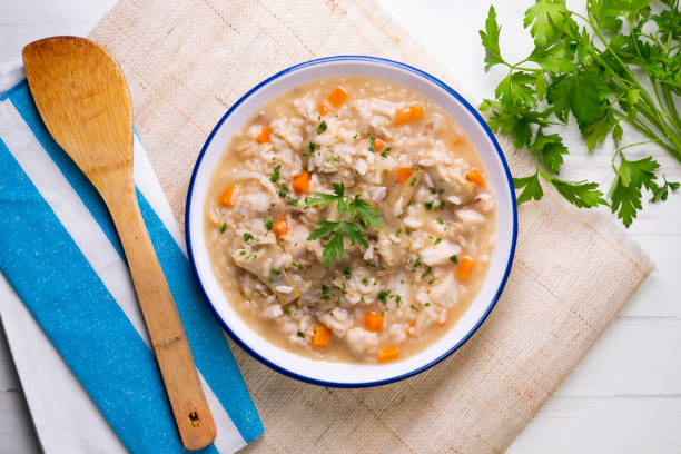 istock Soupy rice with artichokes and carrots. Typical Spanish gastronomy platter. 1424269527