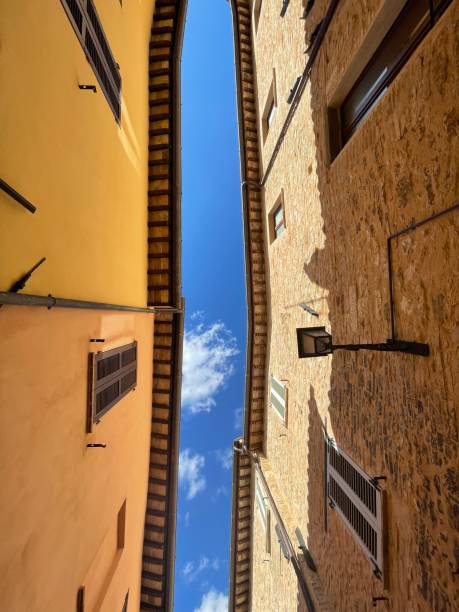 istock Yellow houses with blue sky 1424273193
