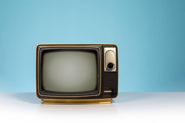 istock Old retro yellow TV receiver set 1424274312
