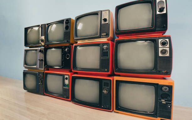 istock Retro old televisions pile in the room. 1424274345