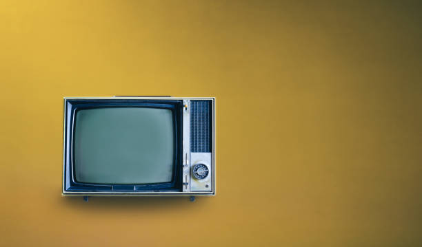 istock Retro television mockup on yellow background. 1424274402
