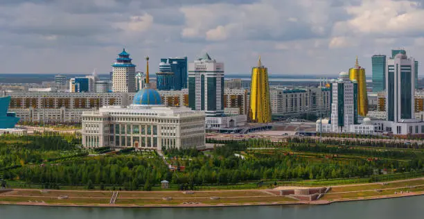 The central part of the capital of Kazakhstan, the city of Astana, and the residence of the President under a cloudy sky