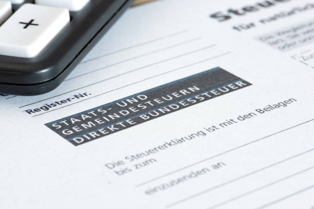 istock Form tax return Switzerland and a calculator 1424277441