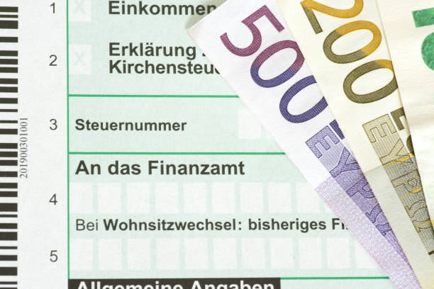 istock Euro banknotes and an income tax return 1424277546
