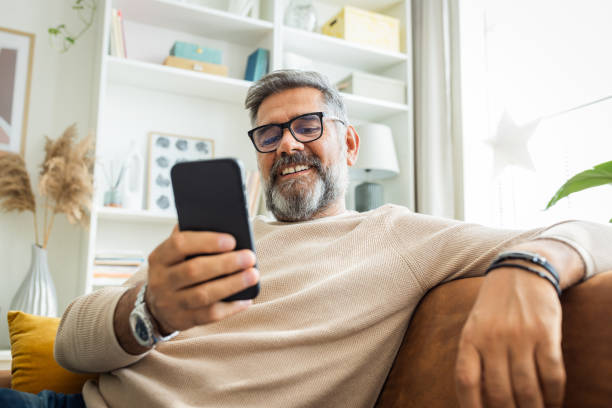 istock Mature man resting at home 1424280019