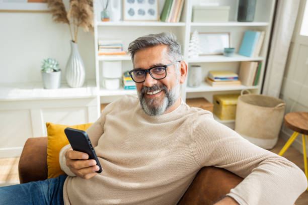 istock Mature man resting at home 1424280035