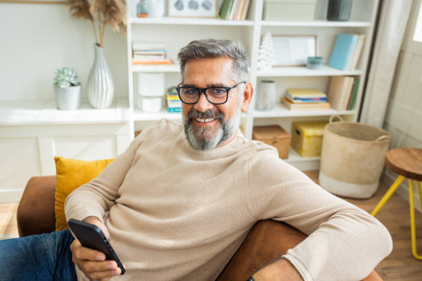 istock Mature man resting at home 1424280062