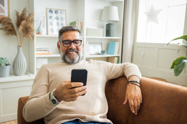 istock Mature man resting at home 1424280072