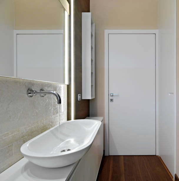 istock modern bathroom with wooden floor 1424287964