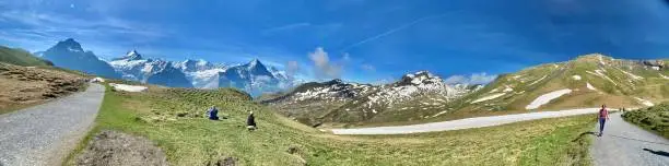 hiking in the bernese alps above grindelwald, switzerland - may 2022.