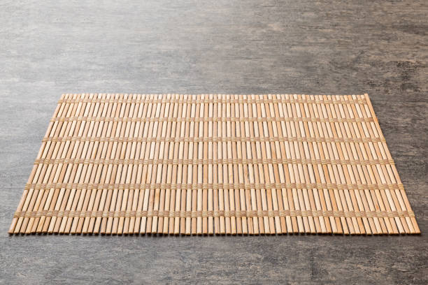 istock Perspective view of brown tablecloth for food on cement background. Empty space for your design 1424295063