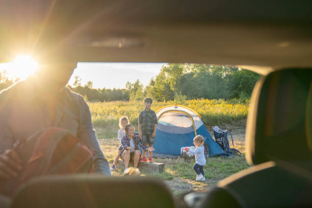 istock Unloading the Car to Set Up Camp 1424296024