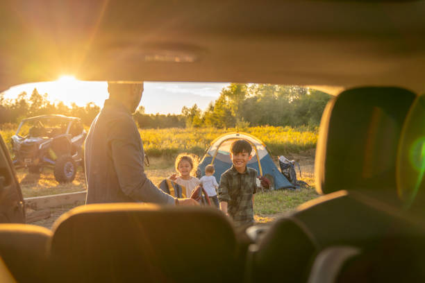 istock Unloading the Car to Set Up Camp 1424296027