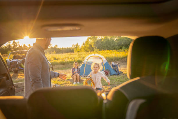 istock Unloading the Car to Set Up Camp 1424296039