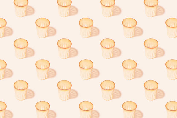 istock wine glasses on pink background 1424299028