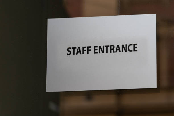 istock Staff Entrance Sign 1424299140