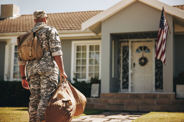 Soldier returning from the military stock photo