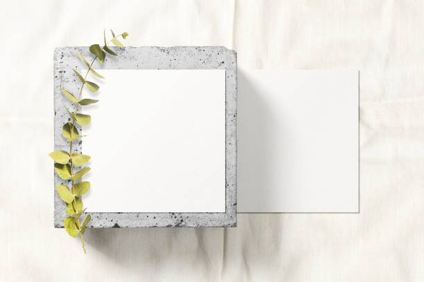 istock Clean minimal square flyer mockup on top brick with dry flower 1424304307
