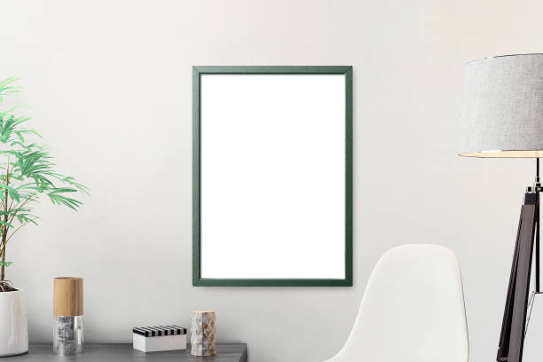 istock Clean minimal frame mockup on the wall with white chair and desktop 1424304376