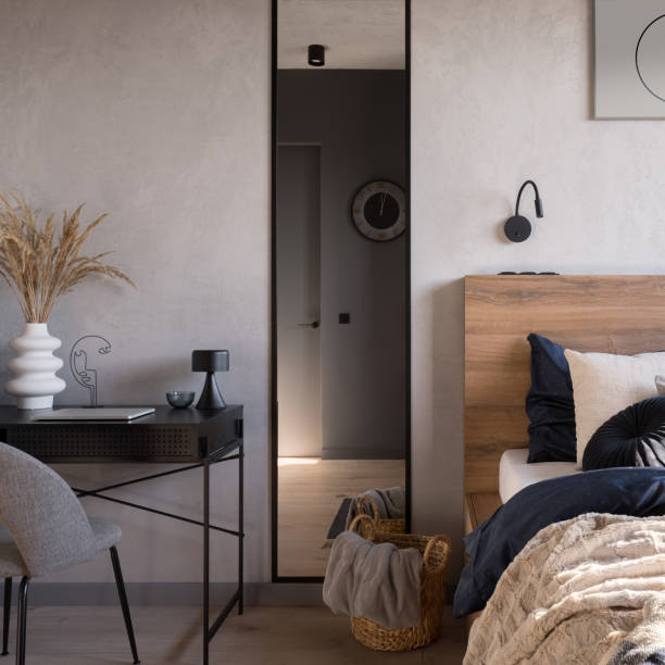 istock Mirror in bedroom with desk 1424310378