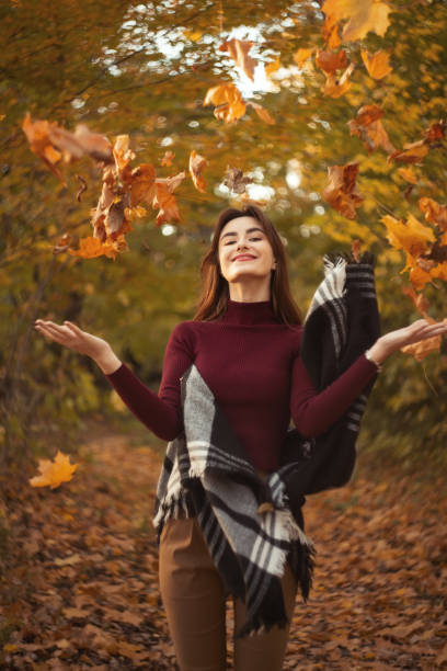 istock happy autumn girl 1424310446