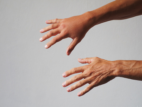 One male hand swollen. Close-up.