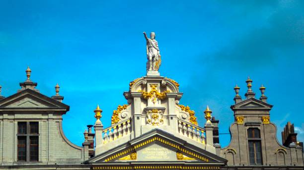 Beautiful statue On the top of the Golden Boat house in The Grand Place Brussels
