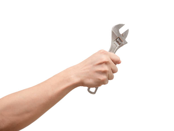 istock Hand holding adjustable wrench on white isolated background,Labor tool technician 1424327314