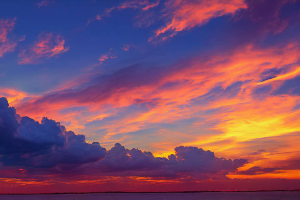istock Beautiful orange and purple sky and clouds at sunset. 1424331506