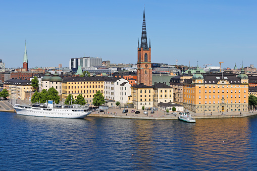 daytime view of the Stockholm skyline featuring Gamla stan, and Riddarholmen (Sweden).
