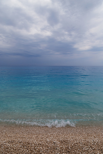 Dark stormy dramatic sky over Ionian sea. Myrtos Beach, Cephalonia island, Greece, Europe
