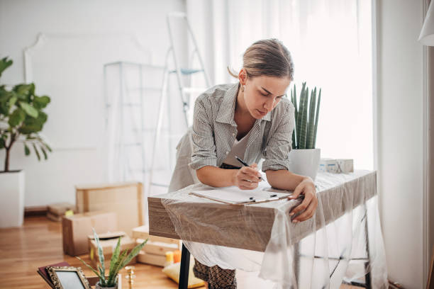 istock Woman in new apartment 1424336145