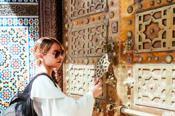 istock woman knocking on a Moroccan door 1424340895