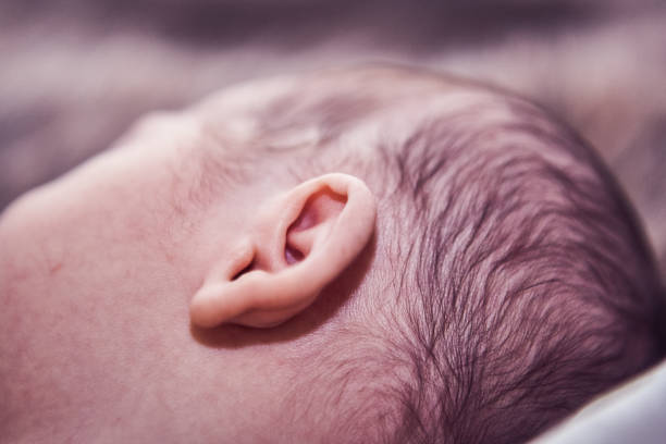 istock Newborn baby boy sleeping 1424340912