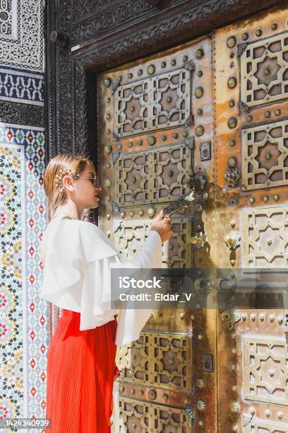 Young Woman At Door Of Mosque Stock Photo - Download Image Now - Adult, Adults Only, Arab Culture