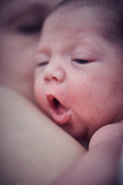 istock Newborn baby boy with mother 1424342943