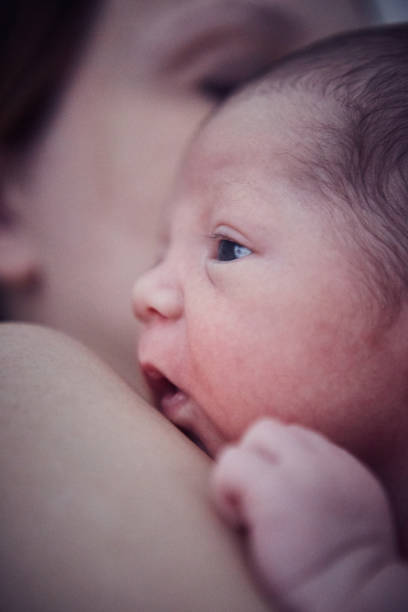 istock Newborn baby boy with mother 1424342998