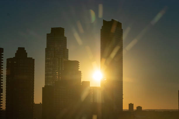 istock Buildings in New York illuminated by sunset 1424344931