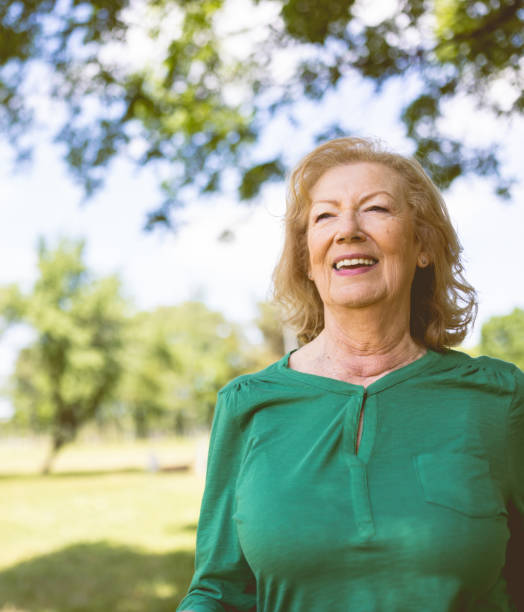 istock Active senior woman jogging outdoor 1424352305