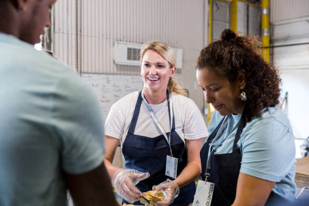 istock Women smile and welcome those in need 1424369194