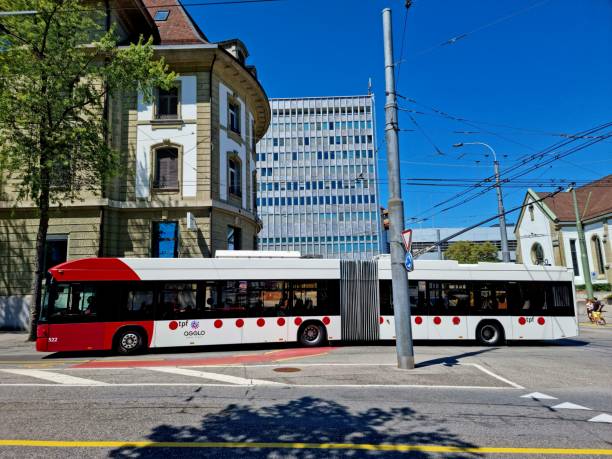 Fribourg (Freiburg / Switzerland) Fribourg It is a major economic, administrative and educational center on the cultural border between German and French Switzerland (Romandy). The Image shows the city partial with a trolley bus. fribourg city switzerland stock pictures, royalty-free photos & images