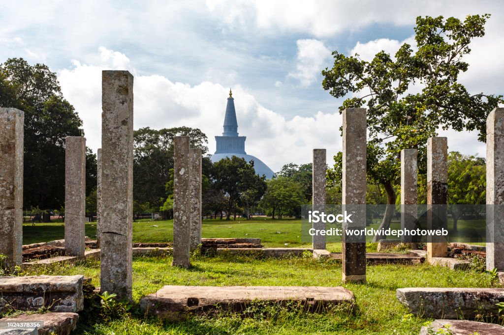 View at the Ruwanwelisaya Stupa and nearby ancient ruins in Anaradhapura, Sri Lanka, Asia Ancient Stock Photo