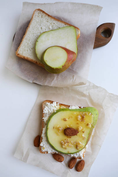istock sandwich with cottage cheese, pear, honey and nuts 1424380456