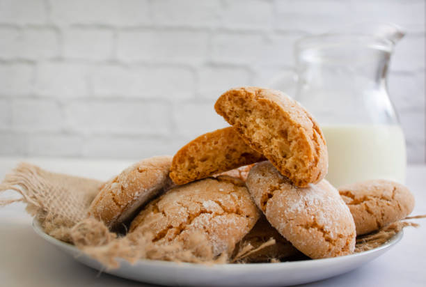 istock Delicious cookies, milk on old background 1424383767