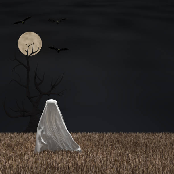 Halloween background. A ghost covered with a white sheet walks across the field.