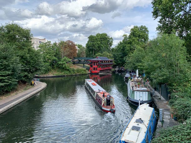 View from The Broad Walk towards Regents Canal. Feng Shang Princess Chinese restaurant in red traditional building. A view of the Regents Canal in London.
