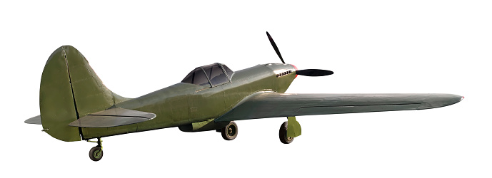 Old military fighter aircraft from world war II green color with a piston engine and a 3-blade propeller. Isolated over the white background