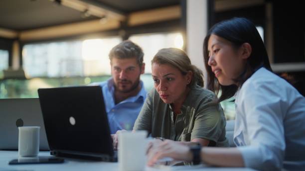 istock Group of business people working together in modern office working space 1424389682
