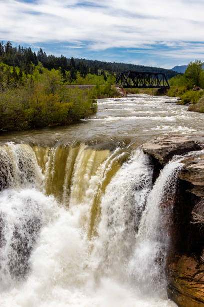 istock Thunder water over the falls in early spring. Lundbeck Falls PRA, Alberta, Canada 1424391640